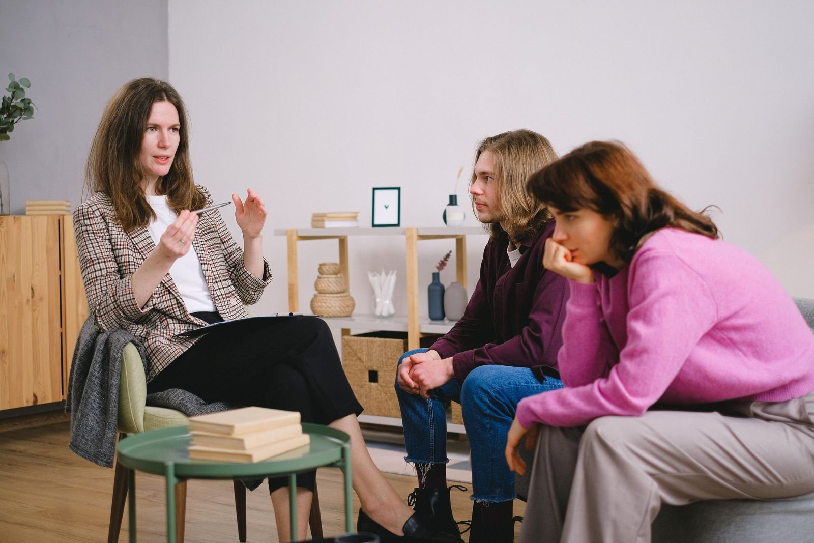 Students discussing their study plans with an advisor